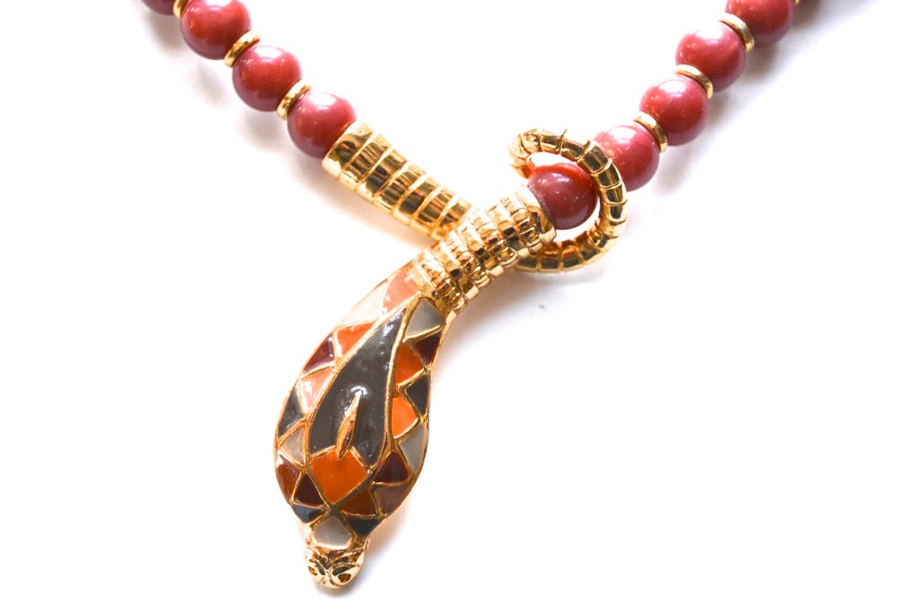 Vintage documented Egyptian Revival Hattie Carnegie cobra necklace in a rare color. It is a book piece and well know, sometimes signed and others not. This piece is not signed.  The color is very pretty and condition is excellent.  Finish is as if