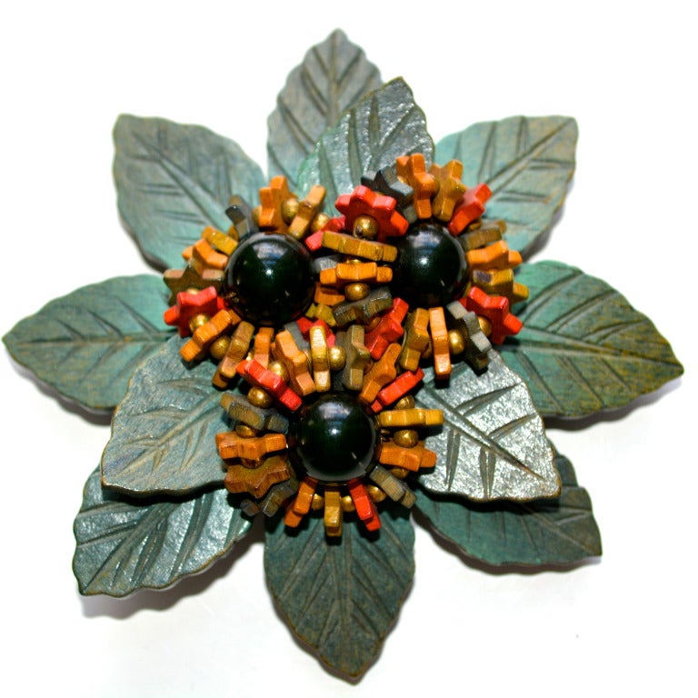 Large Frank Hess early unsigned wooden beads and leaves brooch.  This 40s Hess for Miriam Haskell brooch is unsigned, as was typical for this era, circa 1940.  The wooden star shaped beads, back construction, and design is however well documented.  