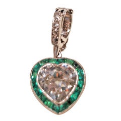 Heart Shape Diamond In Emerald Setting Pendant