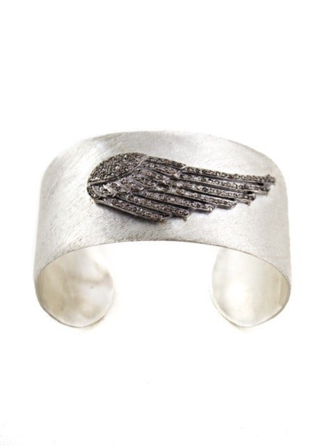 Silver Cuff Bracelet set with Diamond Wing
1.08c  Champagne Diamonds