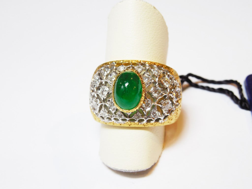 Wonderful 18ct yellow and white gold Emerald cabochon ring.
1 Emerald Cabochon for 1.50 ct
20 diamonds for 0.60 ct
size 51 or 5 3\4