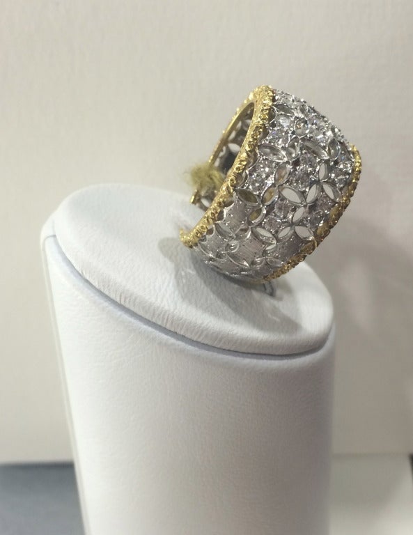 Elegant white and yellow 18k gold  band ring 
16 diamonds for 2ct
coming with certificate and box