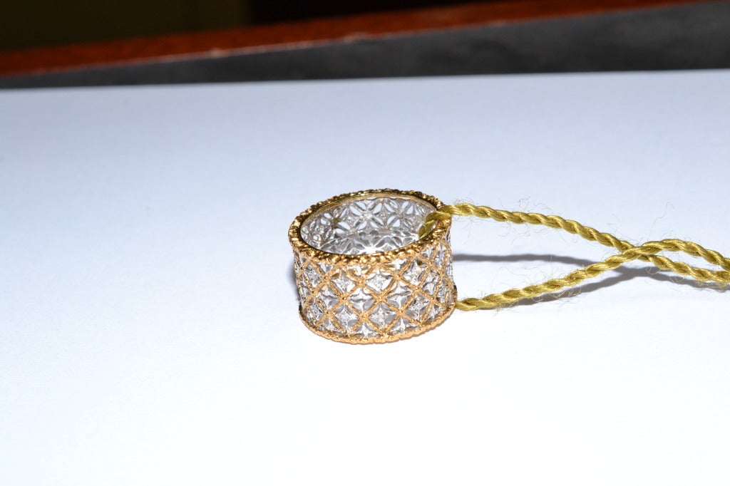 Elegant 18k yellow and white gold  band ring decorated with 26 diamonds for.23 karats.
Signed M. Buccellati
Coming with certificate and orginal box
size 7.5