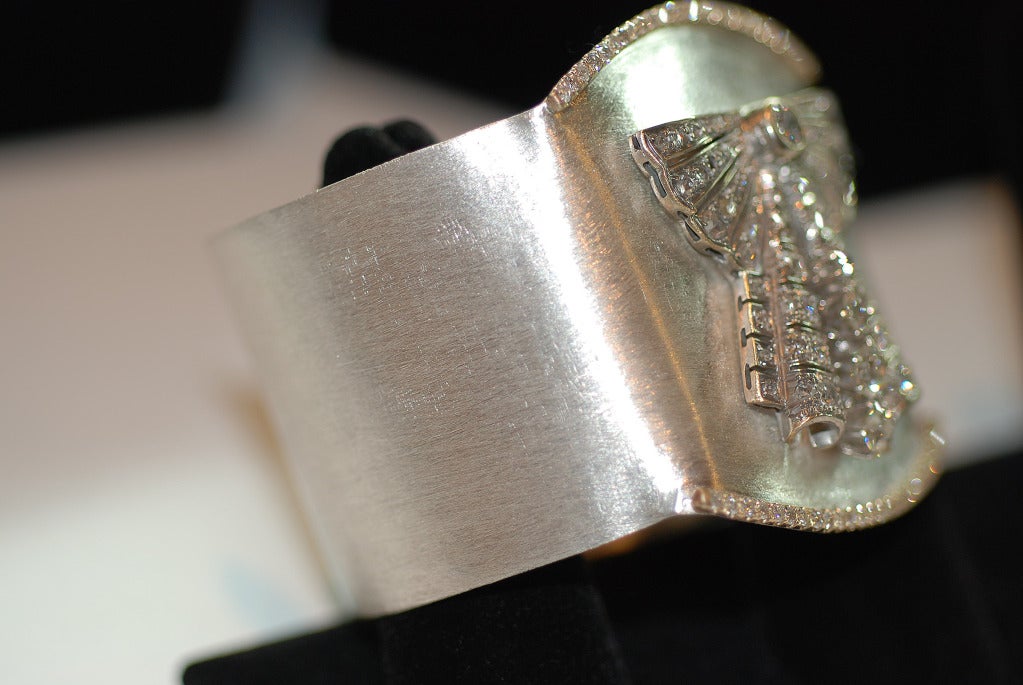 Unique Gold,Silver, and Diamond Cuff Bracelet Containing 4.39 Carats. White Diamonds. 3.3 Carats set in platinum.1.09 carats set in 14k Gold all mounted on 20 Gauge Sterling Silver.