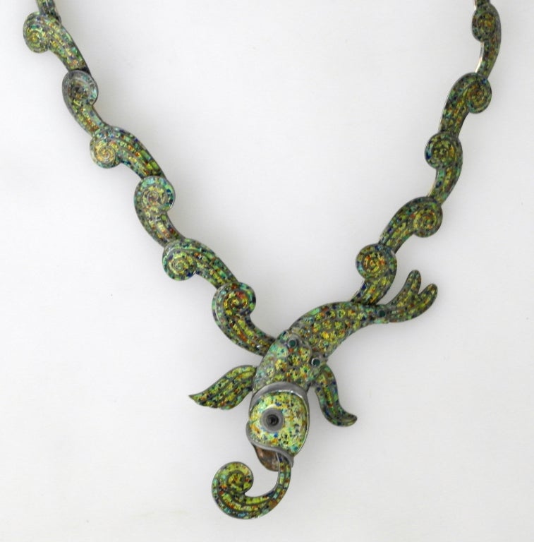 Being offered is a circa 1950 sterling silver and enamel necklace by Margot de Taxco of Taxco, Mexico.

Arguably the most iconic Margot De Taxco necklace in green confetti enamel.  

Pictured in several books:  in green in Margot Van Voorhies,