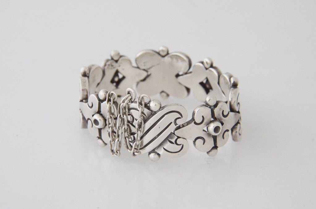 Being offered is a sterling .940 silver bracelet by Hector Aguilar, of Taxco, Mexico, in a chunky motif, epitomizing the master silversmith's aesthetics.  This is bracelet is known as the master's fertility bracelet.  Measurements:  1