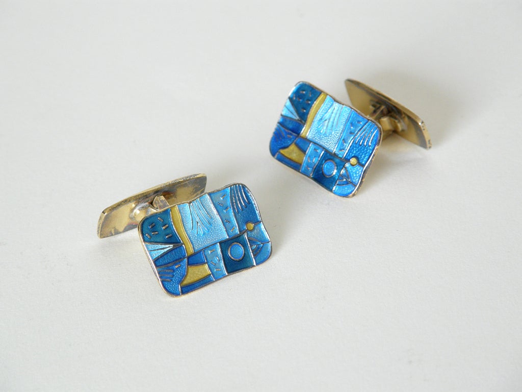 These colorfully enameled cuff links are from the 