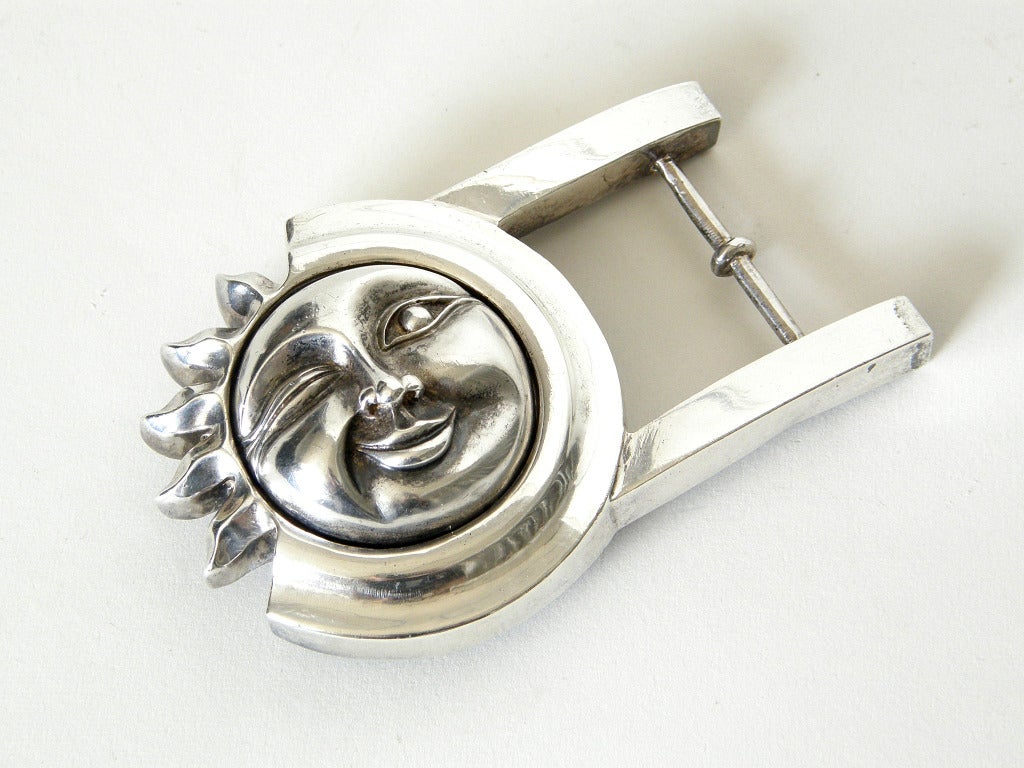 Whimsical sterling belt buckle with a winking sunface by Barry Kieselstein-Cord. Though well-documented, this piece is unsigned. It tests for and is guaranteed to be sterling. No belt is included.

Please use Contact Dealer button if you have any