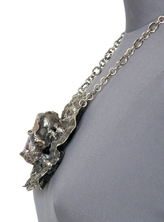This unusual necklace has a chic, brutalist quality. The combination of the 