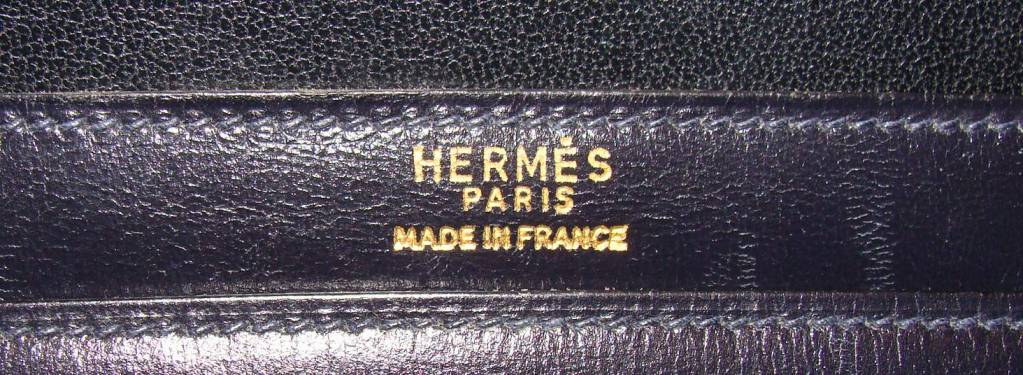 Women's Hermes Medor Clutch in Boxcalf Vintage