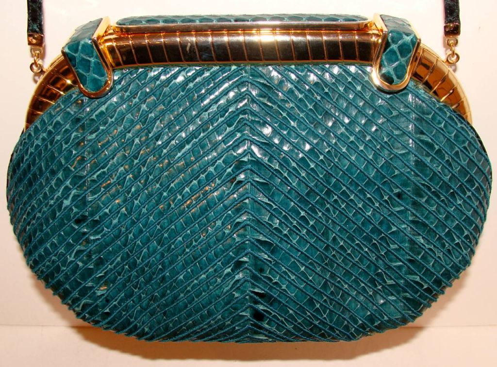 This sweet bag was consigned to us by one of our favorite Bucks County clients.  She is an artist and has classic taste.  Her jige clutches get worn until they all but fall apart, but this lovely piece was spared the hard use.<br />
<br />
The