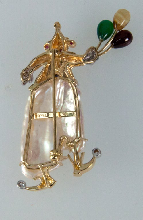 Featuring a Unique Vintage 18k Yellow Gold Multi-gem Balloon Clown Pin/Pendant; Signed & marked: YVEL 750; the clown is wearing Cultured Freshwater Pearl Pants and diamonds on the toes, hands and suit; accented by twinkling ruby, sapphire and