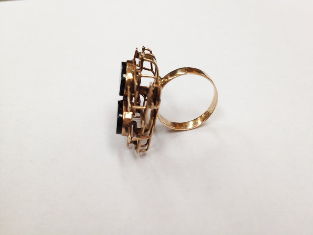 Striking 14K Rose Gold Modernist Dimensional Lattice Design 14k Gold Ring set with two Oval Quartz Stones, measuring approx. 10 x 8mm; ring marked: K14. Ring size 4.75; Complimentary re-sizing available. Circa: 1960s. A must have...Fabulous and