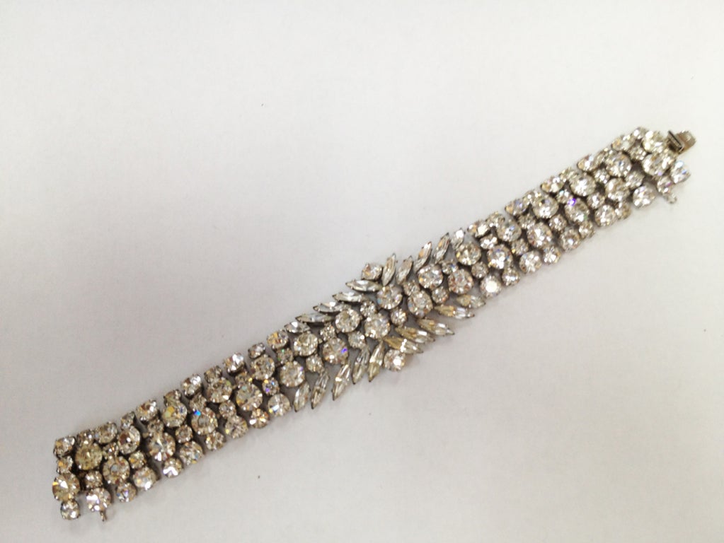 Dazzling signed SHERMAN flexible Retro Bracelet set with clear round and marquis-cut Swarovski Crystals; A Sparkling Classic to wow your friends!