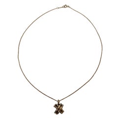 Tiffany & Co. Pendentif croix croisée en argent sterling avec pendentif en forme de X