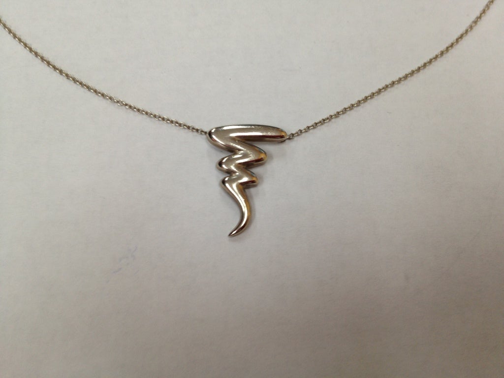 Authentic Sterling Silver Tiffany & Co. Paloma Picasso Thunderbolt Pendant. Marked: Tiffany & Co. Paloma Picasso 925; Clasp marked: T&Co. 925; Paloma Picasso. Approx. chain length 16