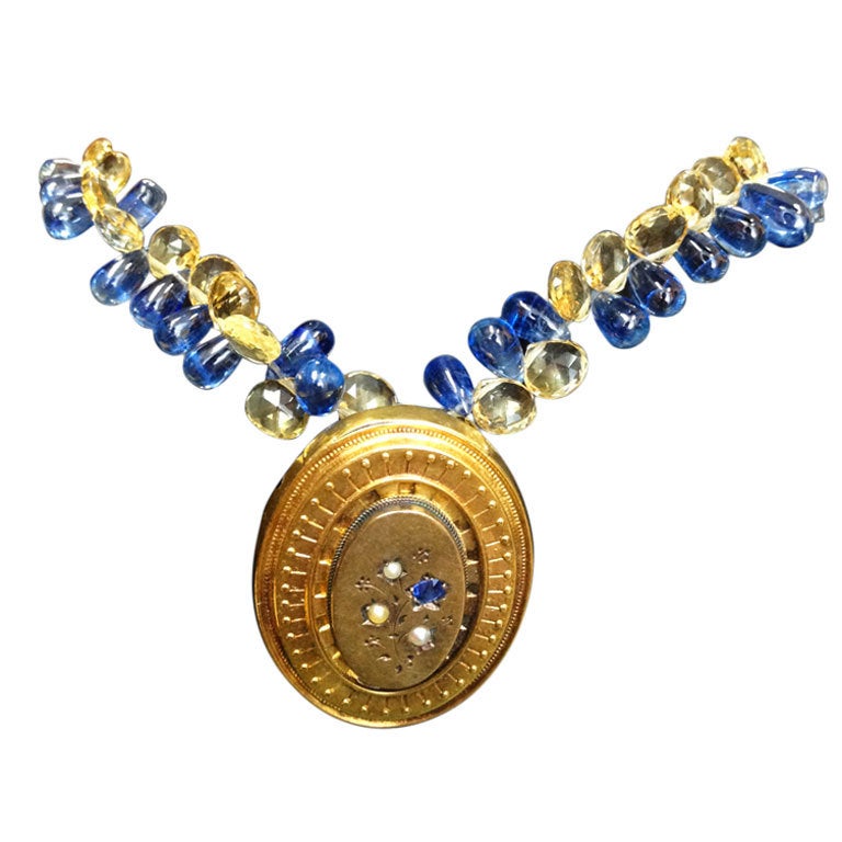 Fabulous Victorian Mourning Locket Pin Brooch accompanied by cabochon teardrop sapphire and facet-cut citrine briolettes; necklace held by an 18k yellow gold clasp; approx size of beautifully handmade locket set with a sapphire and pearls: 36mm x 