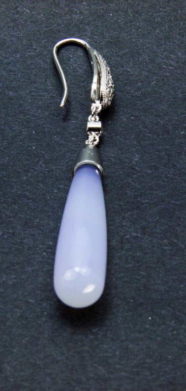 Simply beautiful elegant Diamond and Lavender Chalcedony Dangle Earrings; pavé round brilliant cut diamonds set on posts suspending elongated Torpedo shaped Chalcedony stones. Earring length: 2.8