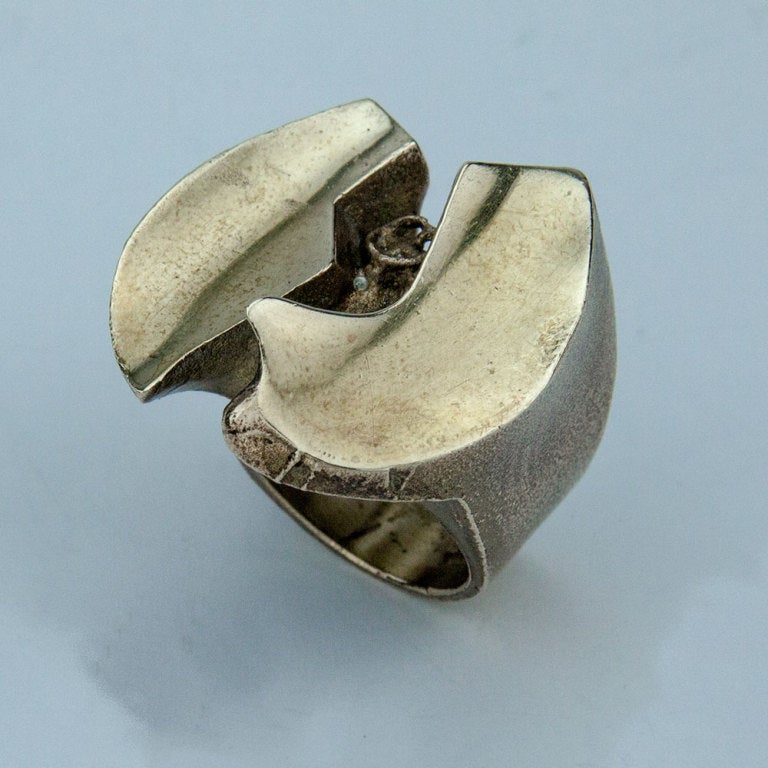 Remarkable Bronze Ring from world renowned Finnish designer Björn Weckström; its angularity and bold presence are typical of Weckström's cutting-edge sculptural style of design…abstract modern, evoking a sense of fantasy and the unknown; Sculpture