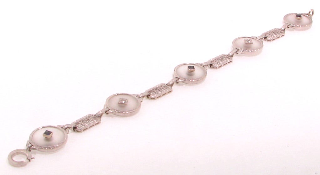 Beautiful and so wearable Art Deco 14K White Gold Crystal, Diamond Bracelet; alternating discs set with Diamonds and Blue Stones may be synthetic sapphire (accurate for the period); measuring approx. 7