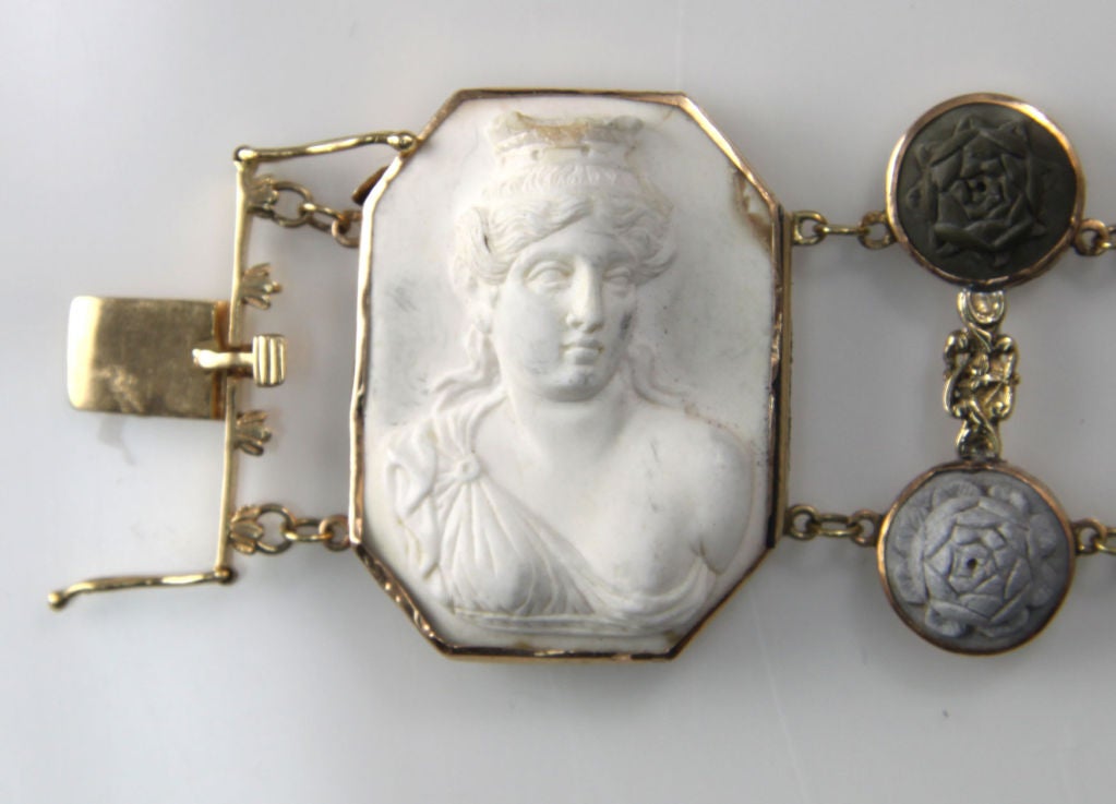 Beautiful Rare 19th Century Victorian Hand Carved Lava Cameo Bracelet set in Hand Made 14k Yellow Gold Mounting, comprising four rectangular panels of beautiful women; hand carved in high relief, each measuring approx. 1 ½” x 1”, inter-spaced with