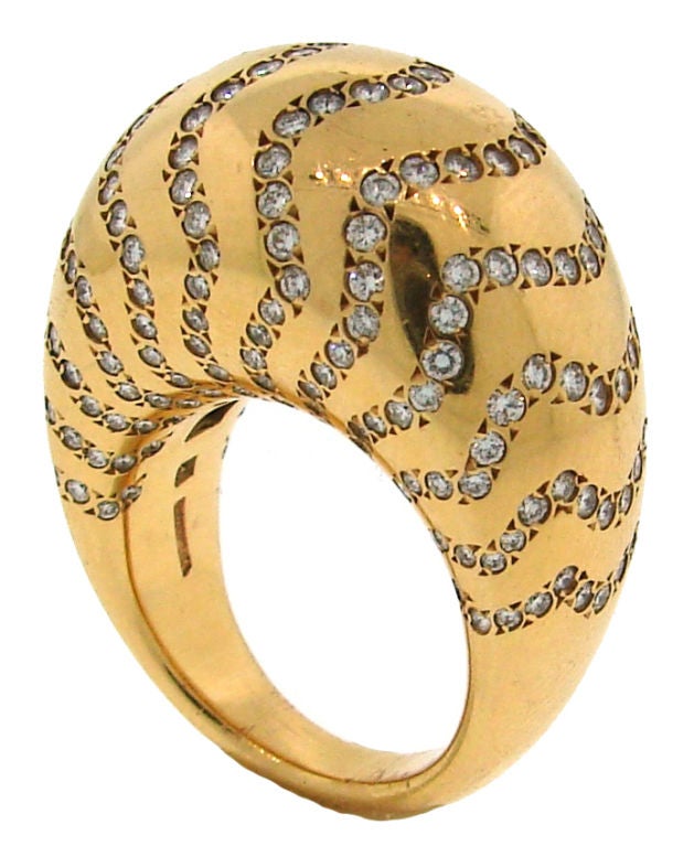 Elegant and chic ring created by Vhernier in the 1990's in Italy. It is made of yellow gold and set with round diamonds.<br />
Ring is size 5.5. It is 1/2