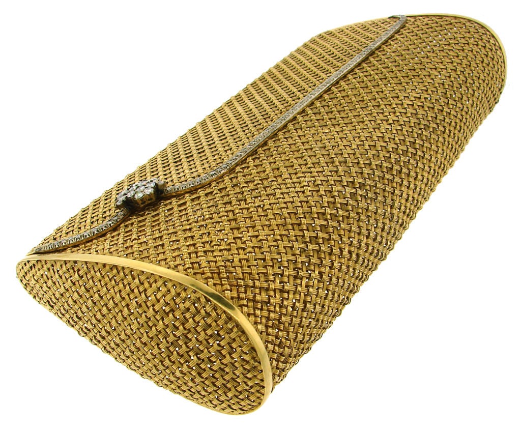 Chic and elegant evening bag created by Van Cleef & Arpels in the 1970's. It is made of woven yellow gold and tastefully decorated with round and marquise cut diamonds.