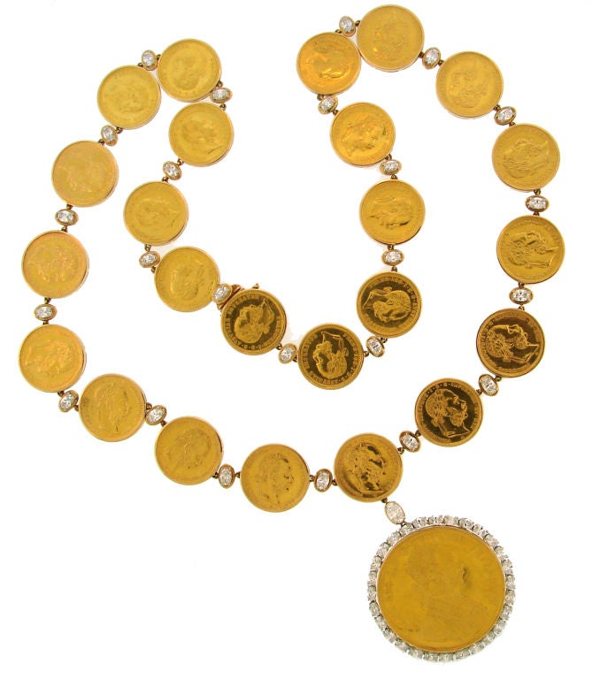 Amazing and unique antique 22k gold coins and diamond necklace created by Oscar Heyman & Bros. in the 1980's. The highlights of the necklace are: a big yellow gold Austrian coin pendant framed in a circle of oval cut diamonds and twenty four smaller