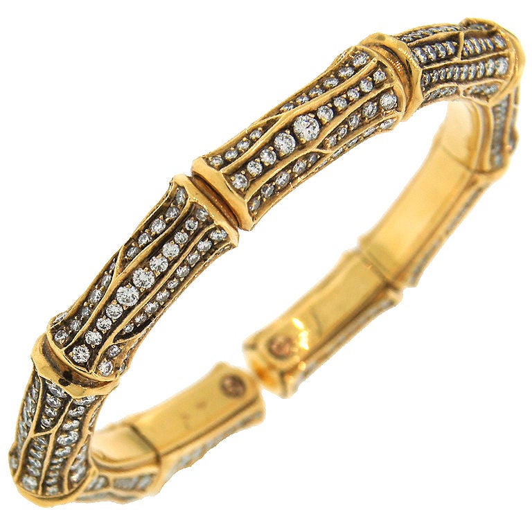 CARTIER Bamboo Collection Diamond and Yellow Gold Bangle Bracelet at  1stDibs | cartier bamboo bracelet, bamboo cartier, cartier bamboo necklace