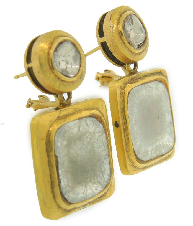 Old Indian (circa 1930's) rose cut diamonds & 22k gold earrings featuring impressive size square rose cut diamonds. The rose cut diamonds measure 19.2 mm x 19.0 mm and 19.1 mm x 17.6 mm. The round top diamonds are in average 8.2 mm in diameter.