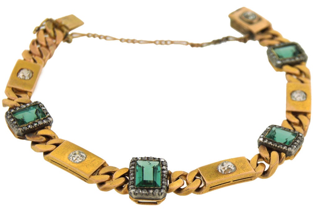 Lovely Victorian bracelet created in Russia in the 1898 - 1908 by Carl Blank, one of Imperial Russia's finest jewelers.<br />
It features four emerald cut green tourmalines and five cushion cut diamonds set in yellow gold. Each tourmaline is framed