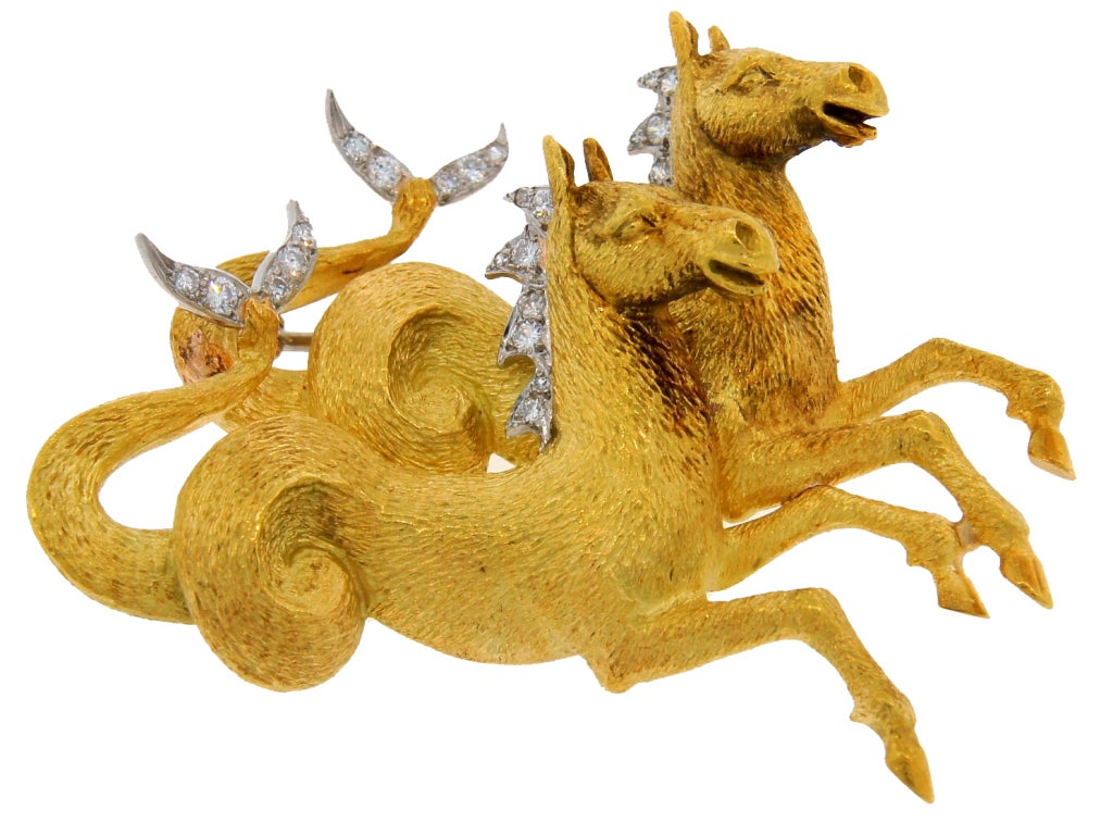 Beautiful horse pin created in 1964.
Amazing combination of jewelry and sculpture.
Wonderful example of two horses in motion which was always a challenge for an artist to create.
Designer piece, signed KOVEN.
Perfect gift for a horse-lover.