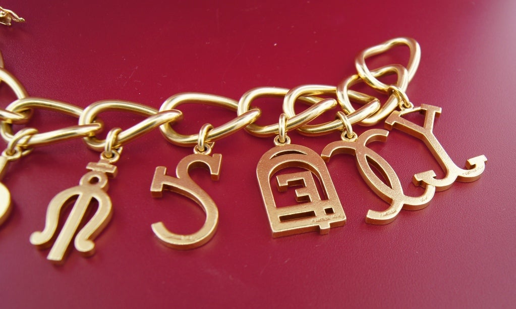 CARTIER Yellow Gold Bracelet with Eight Charms 4