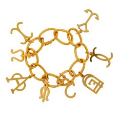 CARTIER Yellow Gold Bracelet with Eight Charms