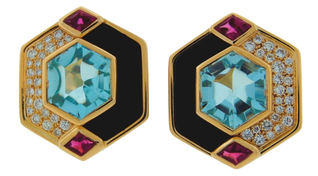 Stunning, colorful and bold earrings created by Marina B in France in the 1980's. Strong geometrical outline, contrast of colors and combination of four different stones are the highlights of this fabulous piece of jewelry. The earrings are clip-on;