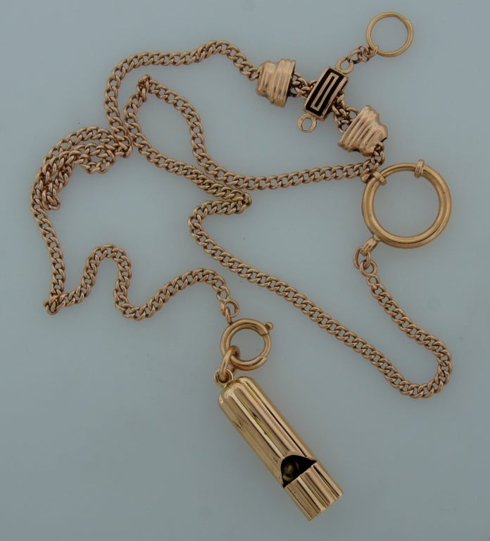 Fun object and unique piece of jewelry - a whistle - created by famous Russian jewelry house Faberge in the 1910'. The whistle is made of 14k rose gold and bears two Faberge maker's marks in Cyrillic and two Russian hallmarks for 14k gold 