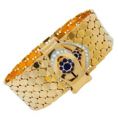 CARTIER Diamond, Sapphire & Yellow Gold Retro Buckle Bracelet