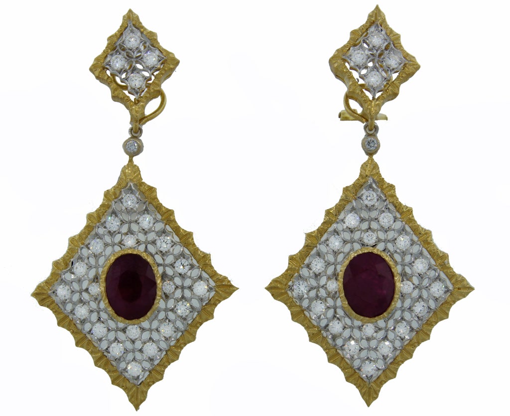 Gorgeous, colorful and versatile earrings created by Mario Buccellati in the 1980's. Royal look the way they are! and understated casual - once you remove the bottom rhombuses. The earrings are made of yellow and white gold and set with round