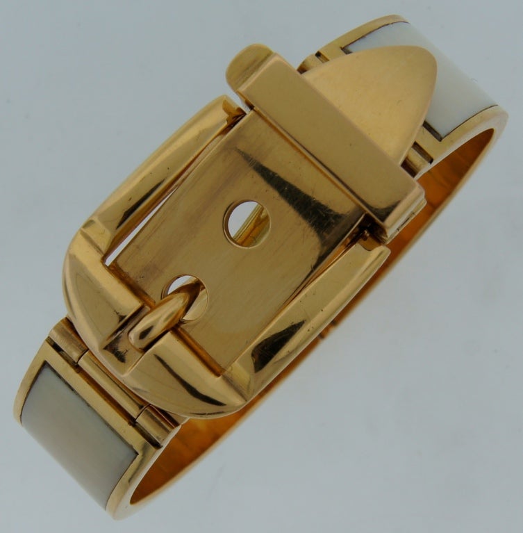 Signature Gucci belt bracelet created in Italy in the 1970's. Made of 18k yellow gold and bone.
Fits up to 7.5