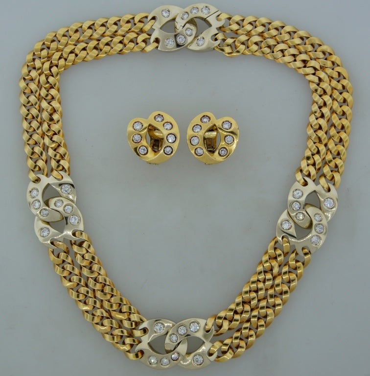 Elegant and sophisticated set consisting of a necklace and a pair of earrings created by Pomellato in Italy in the 1970's. Chic and wearable, the necklace is a great addition to your jewelry collection. 
It is made of 18 karat yellow and white gold