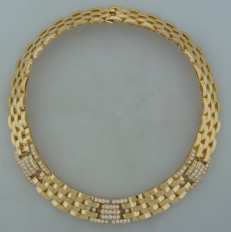 Stunning necklace created by Cartier in the 1990's in France. From Rhodes Collection. 
Making  a statement yet wearable, the necklace is a great addition to your jewelry collection. Beautifully lays on a neck.
Made of yellow gold and accented with