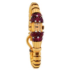 Van Cleef & Arpels Lady's Yellow Gold, Ruby and Diamond Retro Bracelet Watch