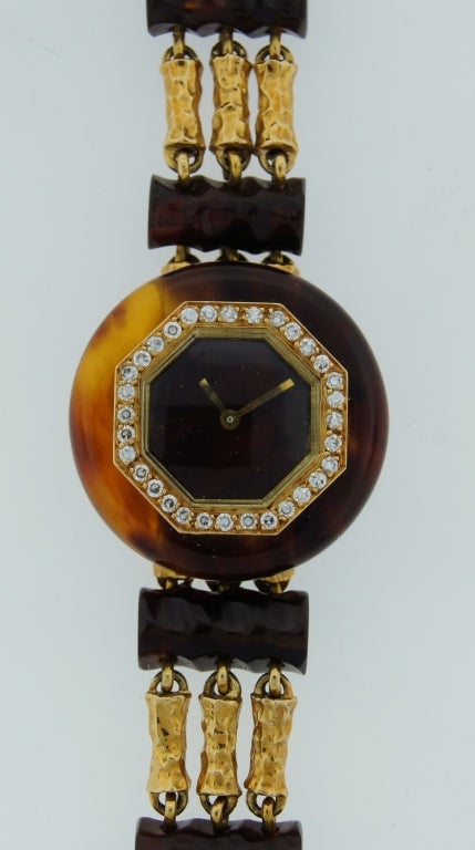 Round Cut Boucheron Lady's Yellow Gold, Bakelite and Diamond Bracelet Watch circa 1970s For Sale