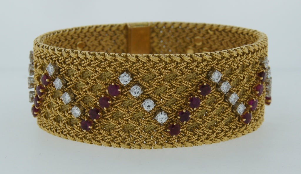 Beautiful elegant bracelet created by Georges Lenfant in Paris in the 1950's. Georges Lenfant was a workmaster for Cartier, Tiffany, Boivin, Gubelin.
Due to special technique and meticulous workmanship on gold the bracelet looks