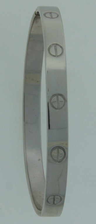 Famous signature Cartier Love bracelet created by Love Collection designer Aldo Cipullo in 1970. Size 17. Signed 