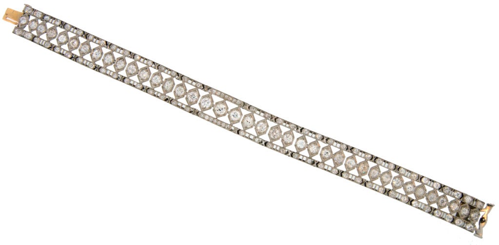 Fabulous elegant and timeless Art Deco bracelet created by Tiffany & Co. in the 1910's. Features Old European cut diamonds set in platinum (tested). Diamond total weight is approximately 11.68 carats, they are G-H-I color, VS- SI1 clarity.  The