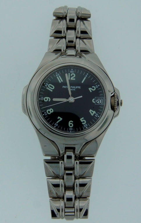 Patek Philippe stainless steel stylish and elegant wristwatch with date and bracelet, Sculpture model, circa 2000s. One of 300 Limited Edition! Model 5091/1A-010, case 38 mm, movement automatic, black dial, stainless steel bracelet. Not in