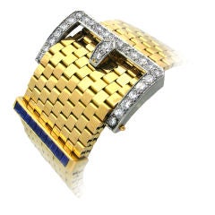 A Gold, Diamond and Sapphire Buckle Bracelet
