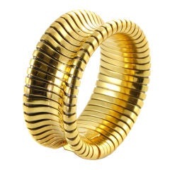 A Gold Gaspipe Bracelet of Inverted Design