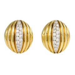 A Pair of Ribbed Gold and Diamond Earrings